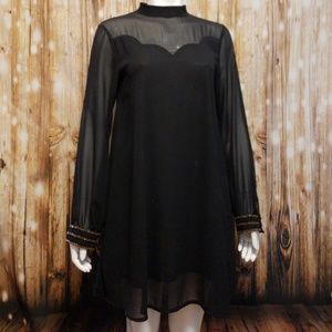 R & J Couture black trapese sheath dress